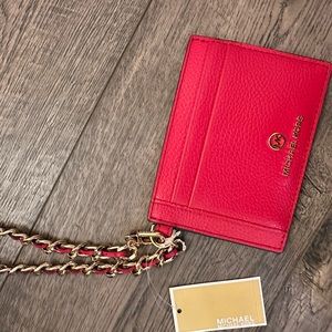 $128 Michael Kors card hold with chain